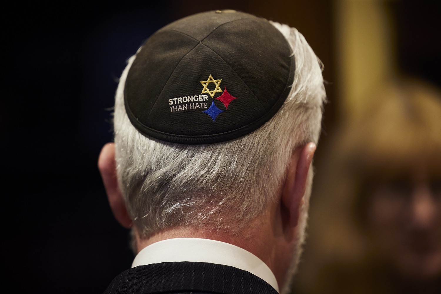 Rabbi Jeffrey Myers wears a Stronger than Hate yarmulke while at Tree of Life synagogue