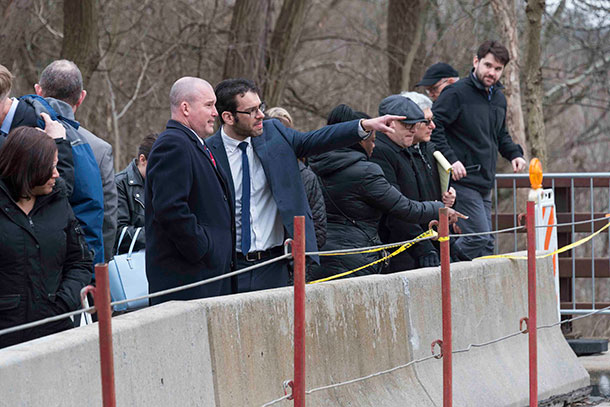 Rep. Mike Schlossberg talks to Sen. Marty Flynn during a visit to the site of Pittsburgh's Fern Hollow Bridge as part of a House Democratic Policy hearing on bridge health and safety in March.