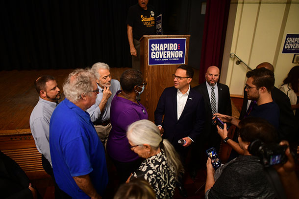 Attorney General Josh Shapiro speaks during a rally with members of SEIU 32BJ.