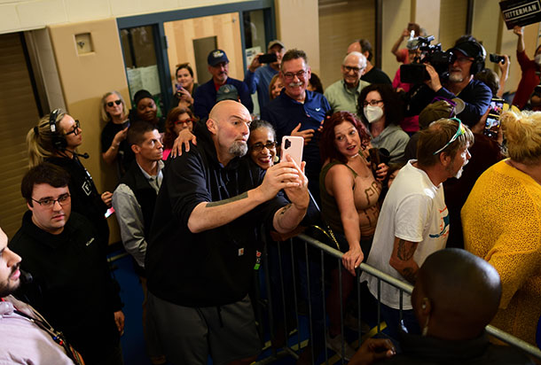 John Fetterman poses for a selfie during a rally in Wallingford, mid-October.