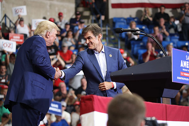 Oz is greeted by former President Donald Trump during a campaign rally in Wilkes-Barre in May.
