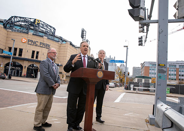 State Reps. Bud Cook, Jim Gregory and Tim Bonner at a press conference outside PNC Park in Pittsburgh in October.