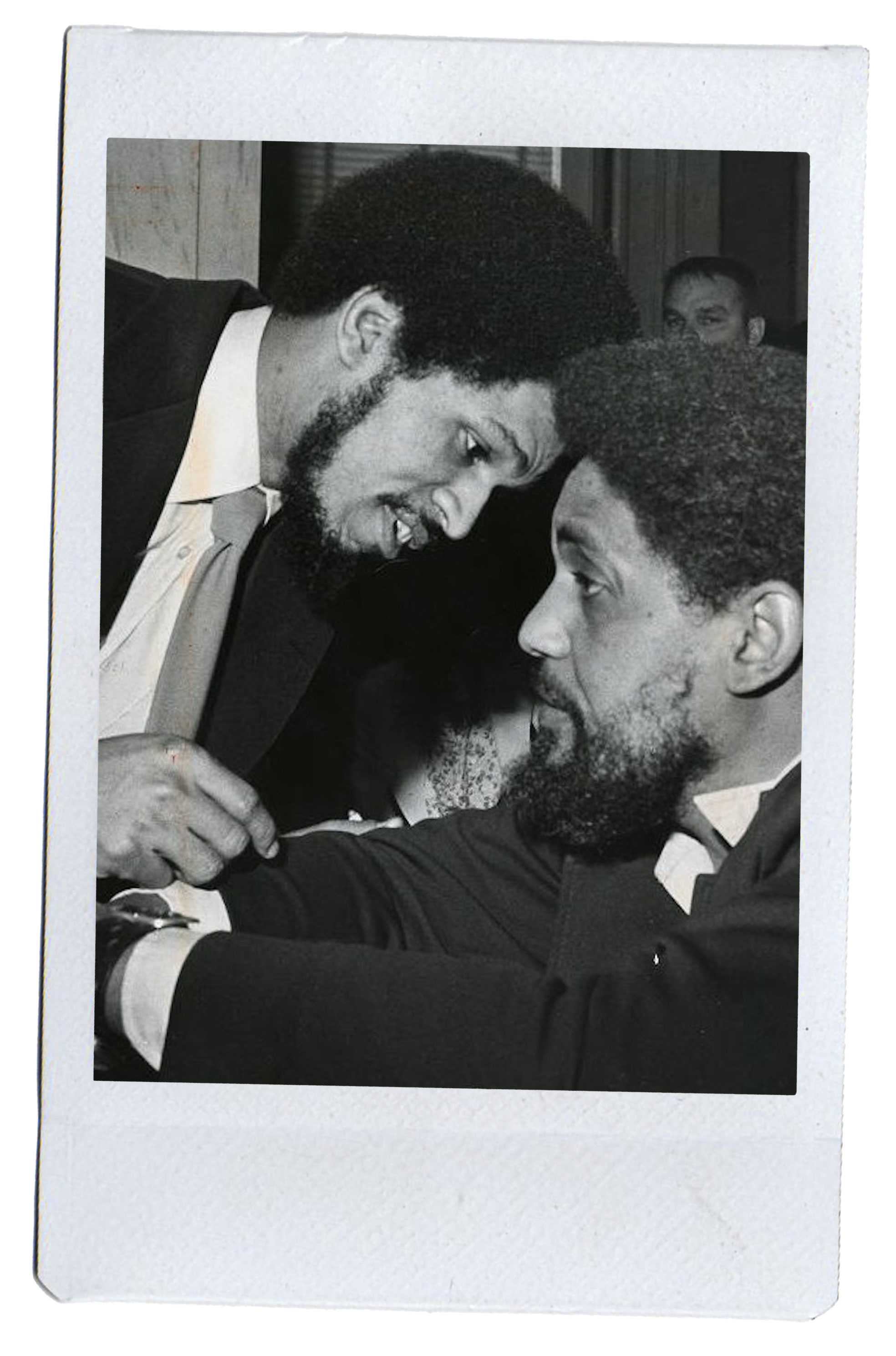 Milton, L, and John Street confer in an undated photo