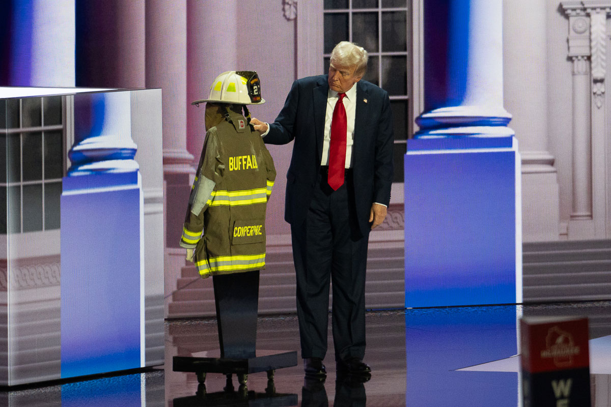 Then-candidate Donald Trump pays his respects to Corey Comperatore at the Republican National Convention in 2024.