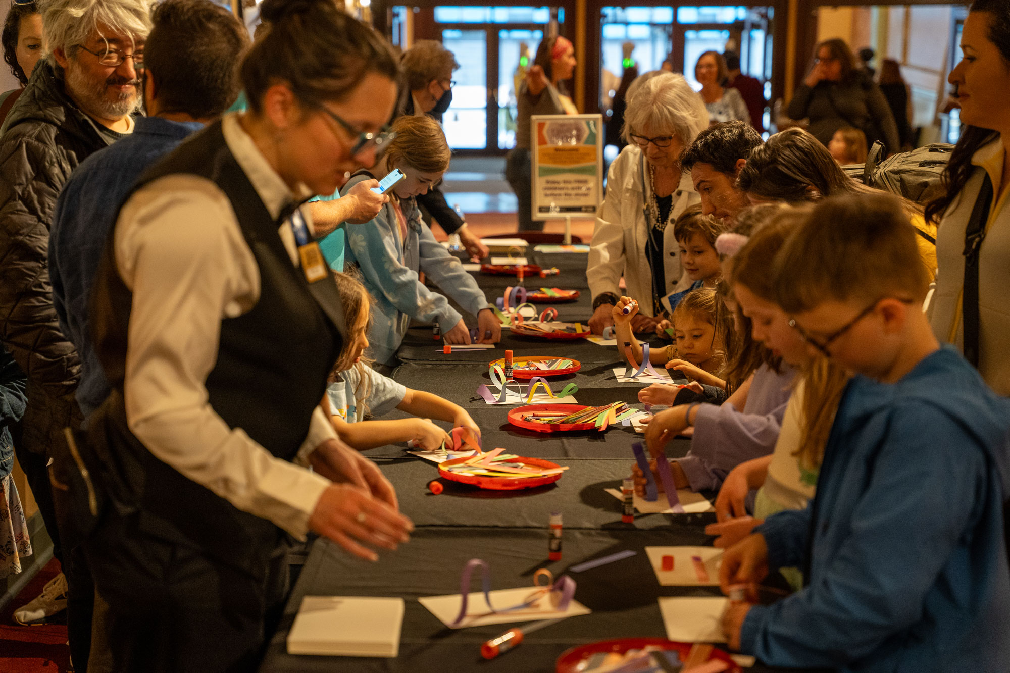 In Pittsburgh, families partake in a pre-show activity as part of the Trust Family Series.