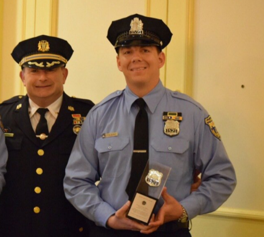 Officer Thomas D'Alesio, right, with Capt. Joseph Bologna