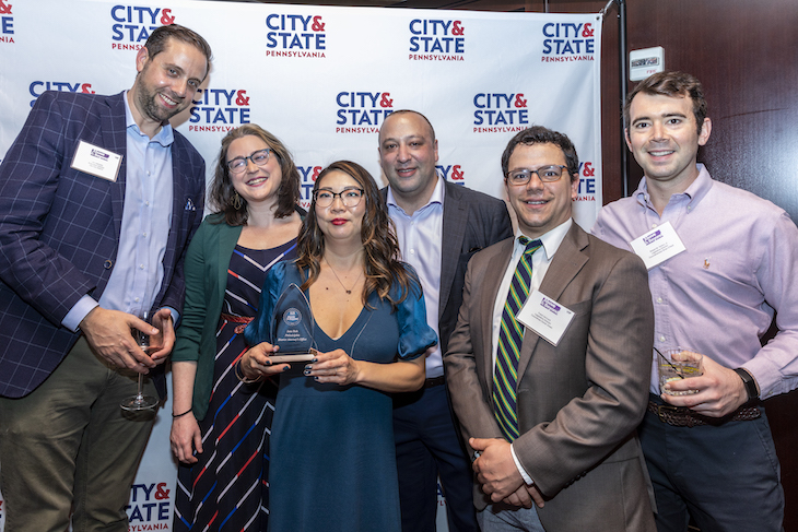 Honoree Jane Roe, Communications Director of Philadelphia District Attorney’s Office, posing with friends and colleagues.