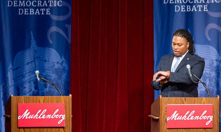 State Rep. Malcolm Kenyatta checks his watch.