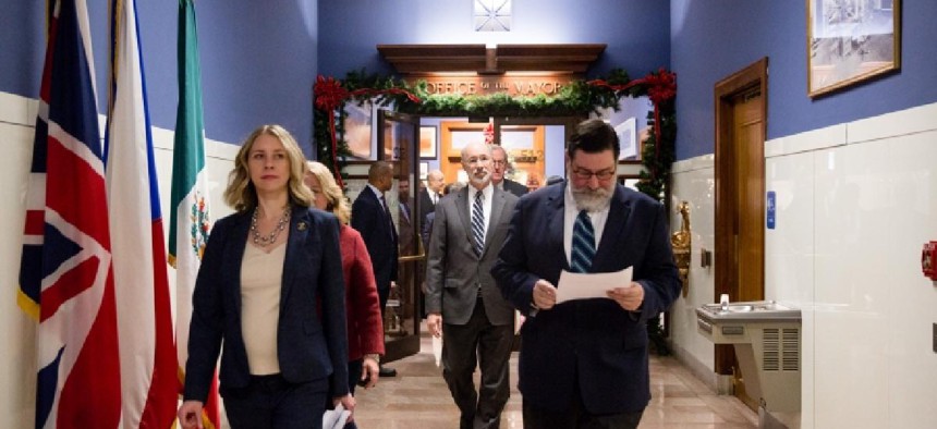 Pittsburgh Mayor Bill Peduto (right) with Gov. Tom Wolf (middle) at a press conference.
