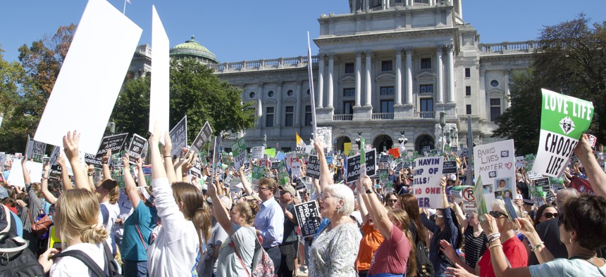 Anti-abortion advocates gather outside the Pennsylvania Capitol in September 2021
