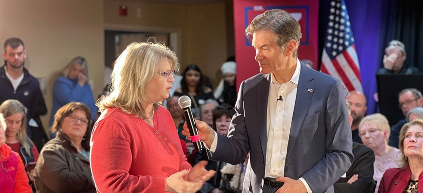 Dr. Mehmet Oz speaks during a campaign event.
