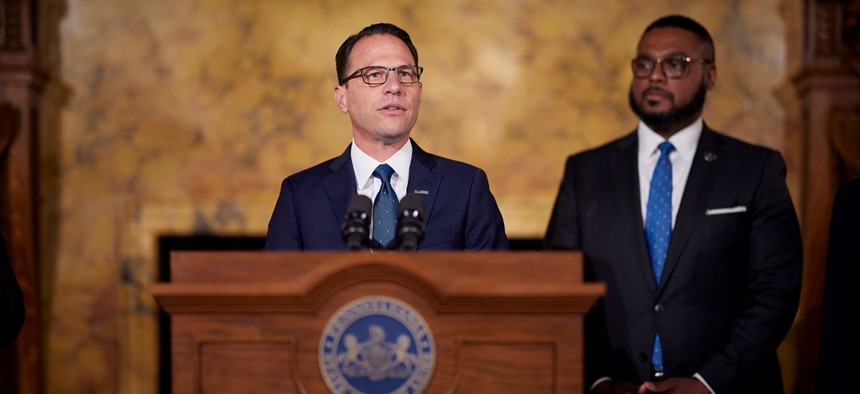 Gov.-elect Josh Shapiro and Lt. Gov.-elect Austin Davis speaking at a press conference about the gubernatorial transition process.