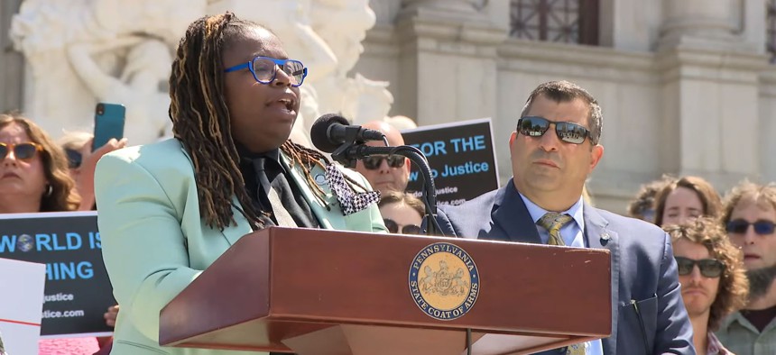 State Reps. La’Tasha Mayes and Mark Rozzi speak on the Capitol steps