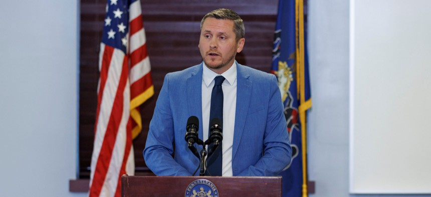 Broadband Development Authority Executive Director Brandon Carson speaks at a press conference