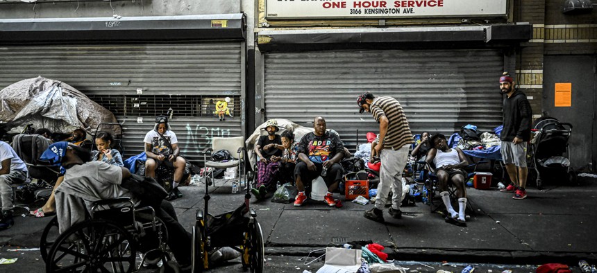 Homeless people are seen on streets of Philadelphia’s Kensington neighborhood.