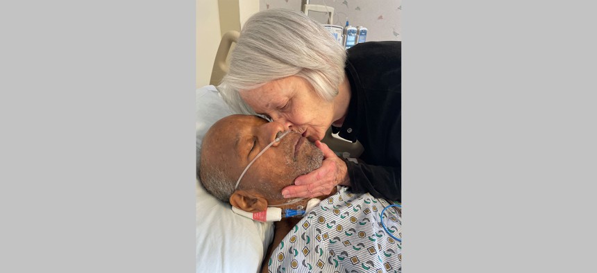 Ezra Bozeman, who died on June 1, receives a kiss from his fiancée, Christine Roess.