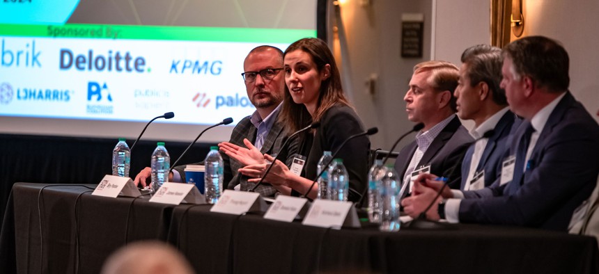 CODE PA's Bry Pardoe speaks during a panel that included, L-R, Chris Shuster of KPMG (moderator), James Kessler of Publicis Sapient, Phong Huynh of Deloitte, and Dominic Folino of the Pennsylvania Blockchain Coalition