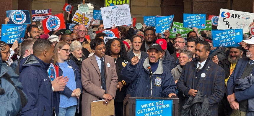 State Sen. Vincent Hughes speaks at a rally on Friday that called for funding solutions to SEPTA’s budget crisis.