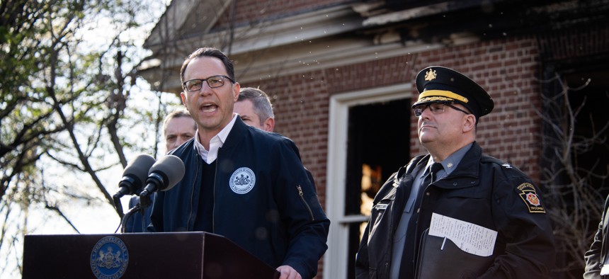 Gov. Josh Shapiro speaks during a press conference outside of the Governor's Mansion after a portion of the property was damaged in an arson fire on April 13, 2025 in Harrisburg, Pennsylvania. Shapiro and his family escaped unharmed and police have a suspect, Cody Balmer, in custody.
